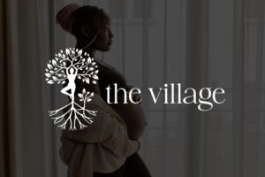 the village logo against a background image.